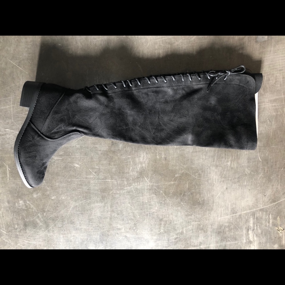 Over the knee flat boot